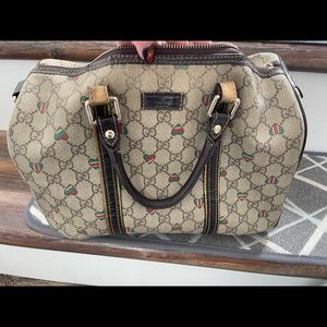WELL loved Gucci bag. Authentic. Signs of wear.